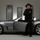 Carroll Shelby, posed with the Ford Shelby Cobra concept in 2004.